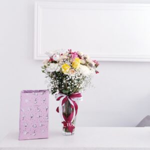 Fresh Flowers In Vase With Chocolates